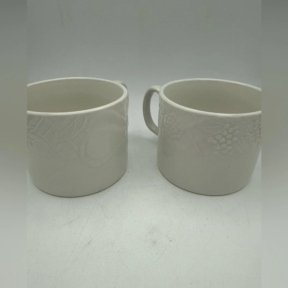 Pair Of Pier 1 Coffee Mugs White raised Fruit grape pears strawberries design